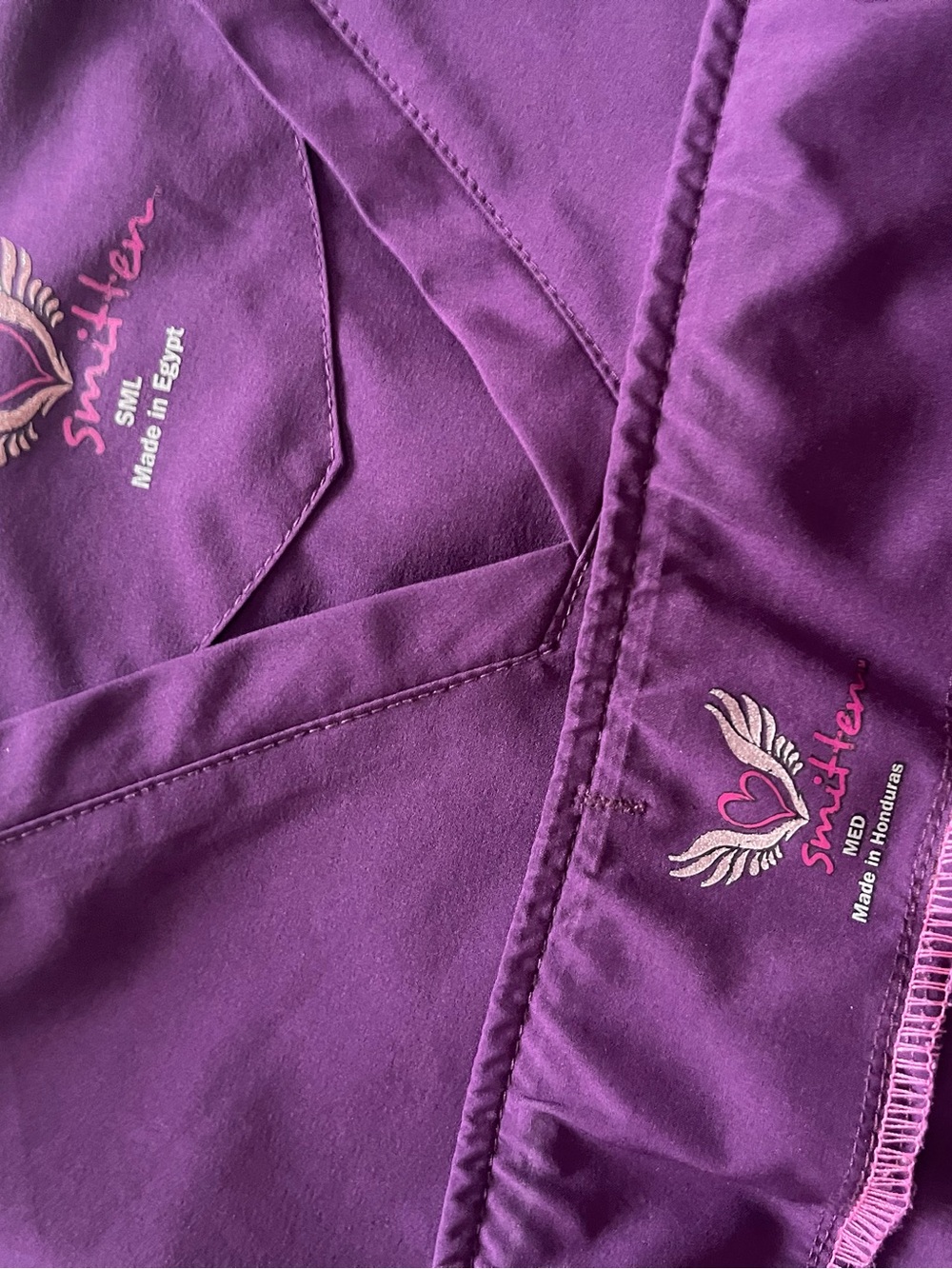 Smitten Purple V-Neck Scrub Top with Winged Heart Logo